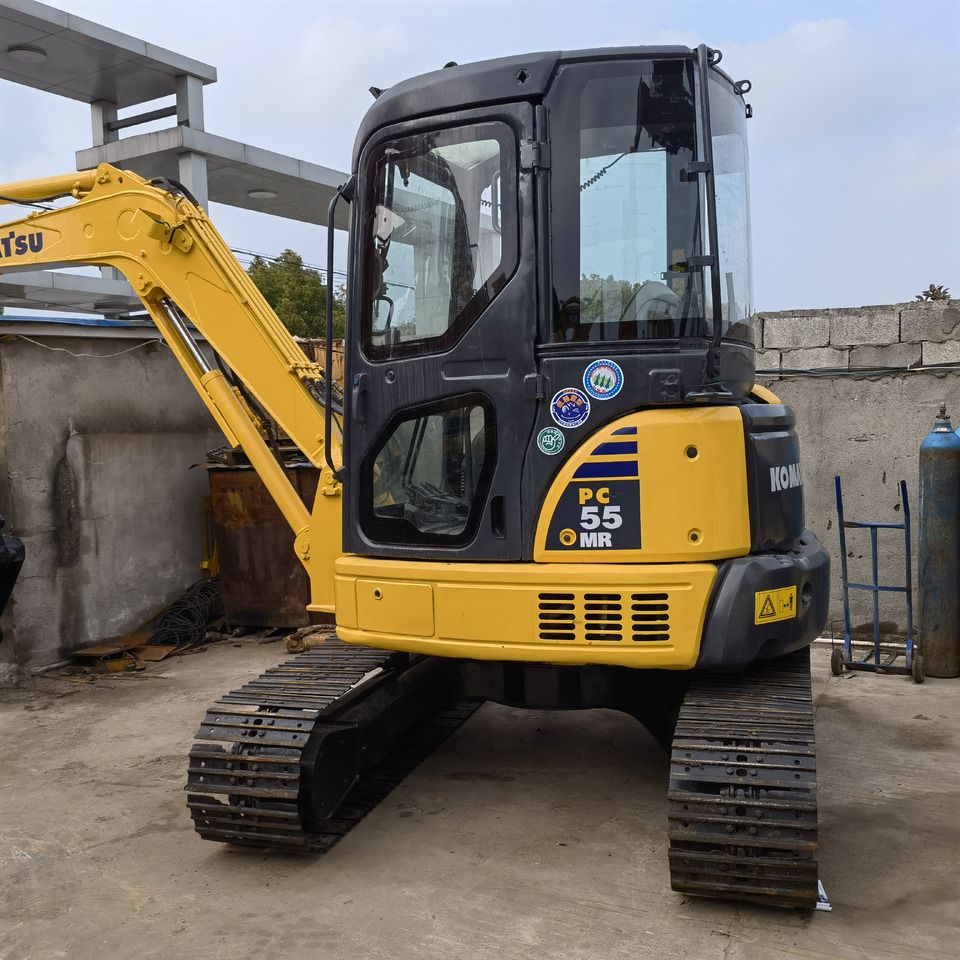 2023 Komatsu PC-55MR mini excavator, rear three-quarter view