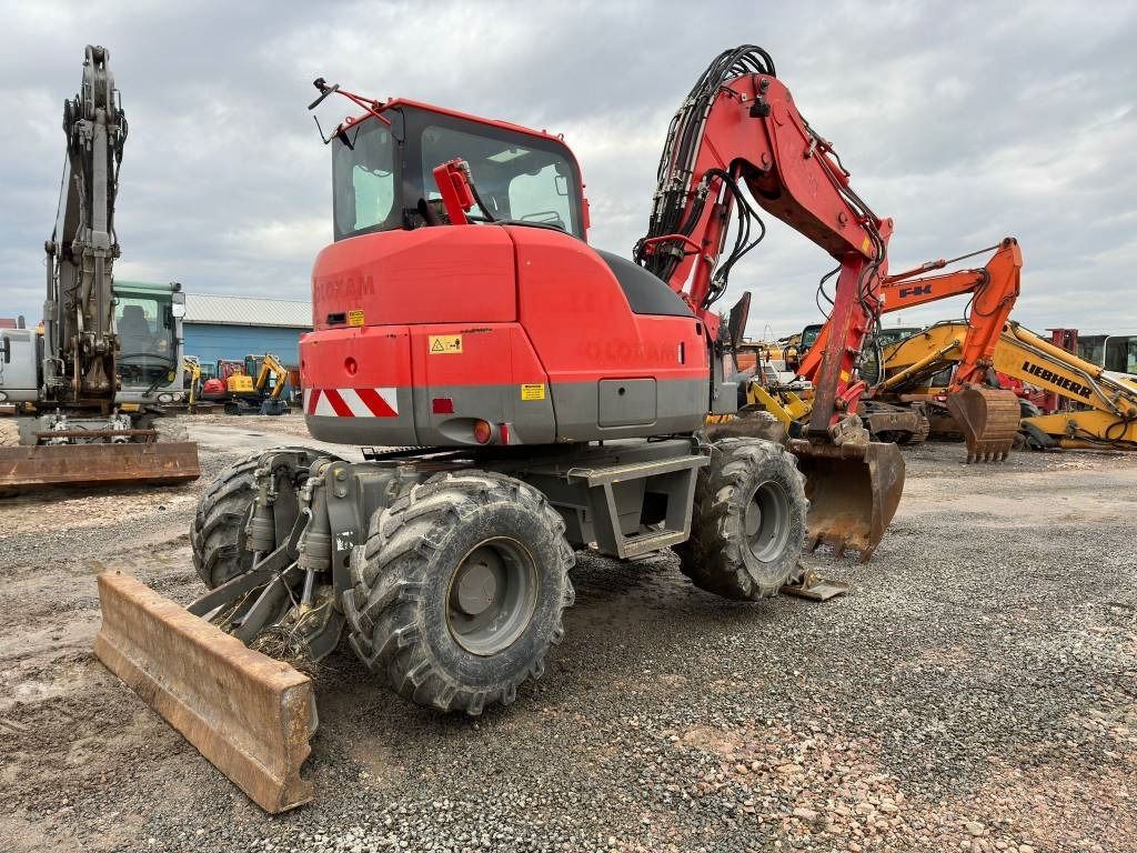 2011 Komatsu PW98MR-8 wheel excavator, rear three-quarter view