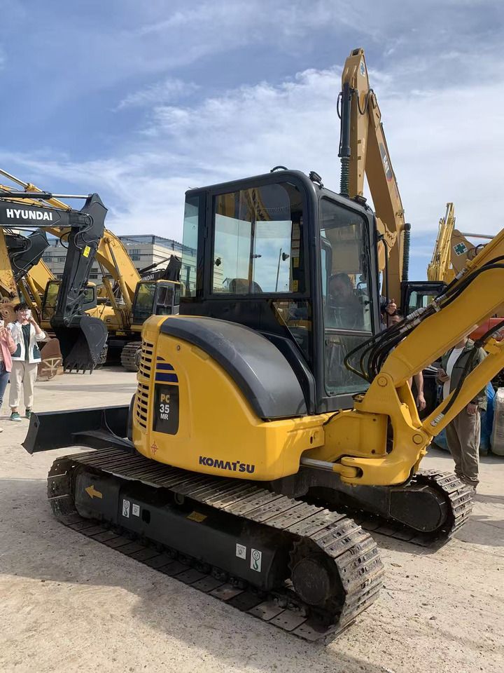2022 Komatsu PC35MR mini excavator, rear three-quarter view 2022 Komatsu PC35MR mini excavator, rear three-quarter view