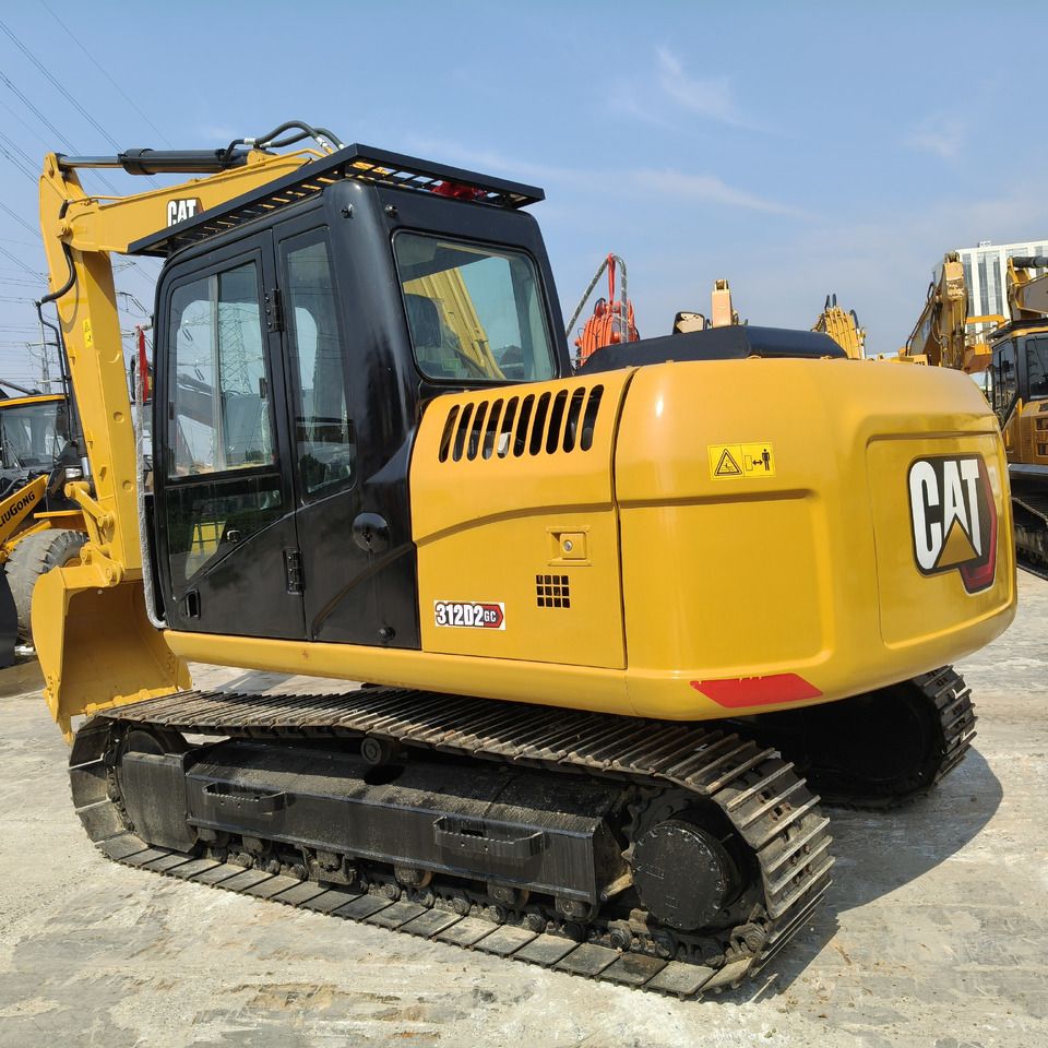 2022 Caterpillar 312D2 GC crawler excavator rear three-quarter view