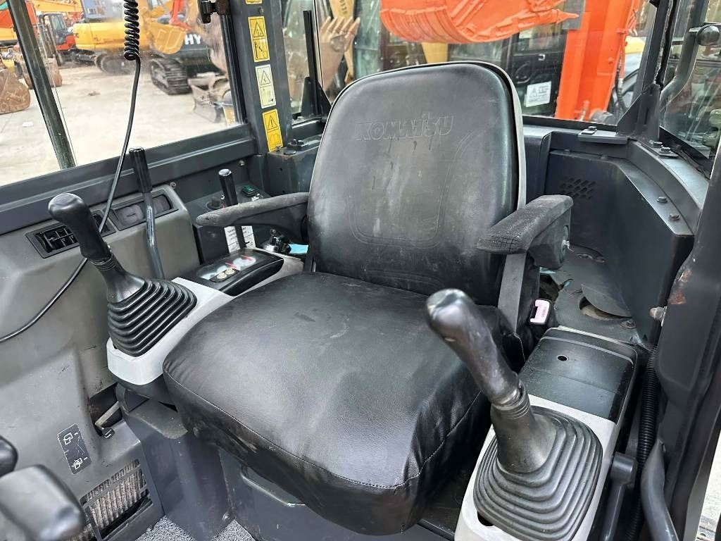 2023 Komatsu PC-55MR mini excavator interior cab view 2023 Komatsu PC-55MR mini excavator interior cab view