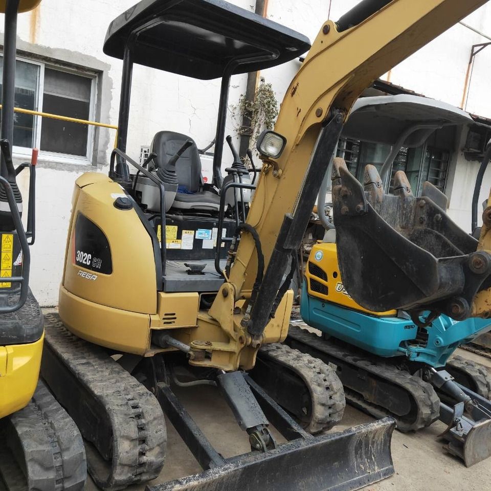 2023 Caterpillar 302CR mini excavator, front three-quarter view 2023 Caterpillar 302CR mini excavator, front three-quarter view