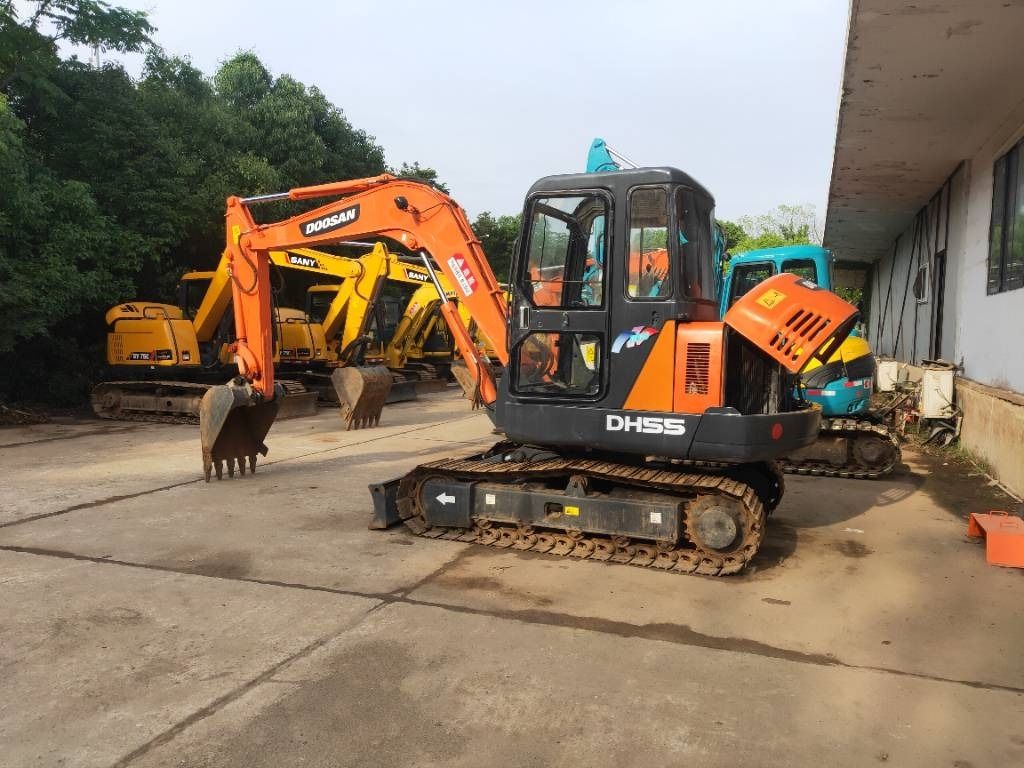 2023 Doosan DH55 mini excavator, side view 2023 Doosan DH55 mini excavator, side view