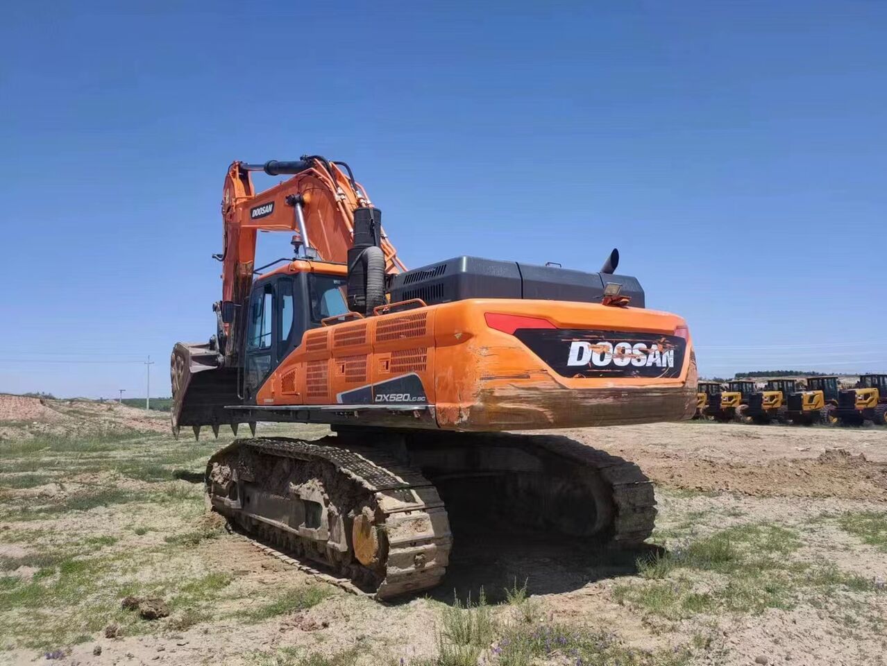 Doosan DX520LC-9C crawler excavator, rear three-quarter view