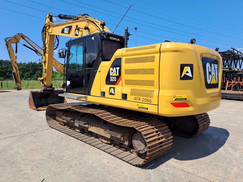 2018 Caterpillar 320 crawler excavator, rear three-quarter view 2018 Caterpillar 320 crawler excavator, rear three-quarter view