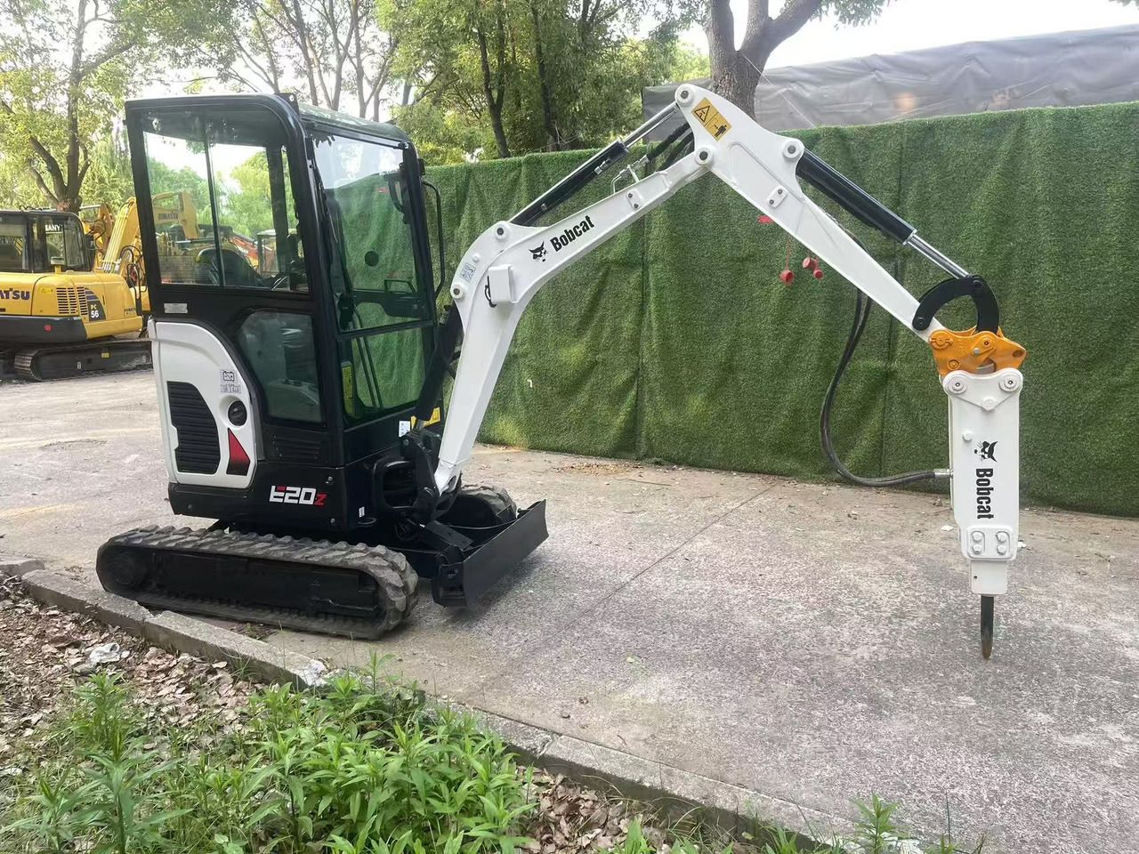 2022 Bobcat E20Z mini excavator, side view with hydraulic breaker