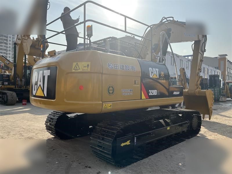 2018 Caterpillar 320D2L crawler excavator, rear three-quarter view 2018 Caterpillar 320D2L crawler excavator, rear three-quarter view