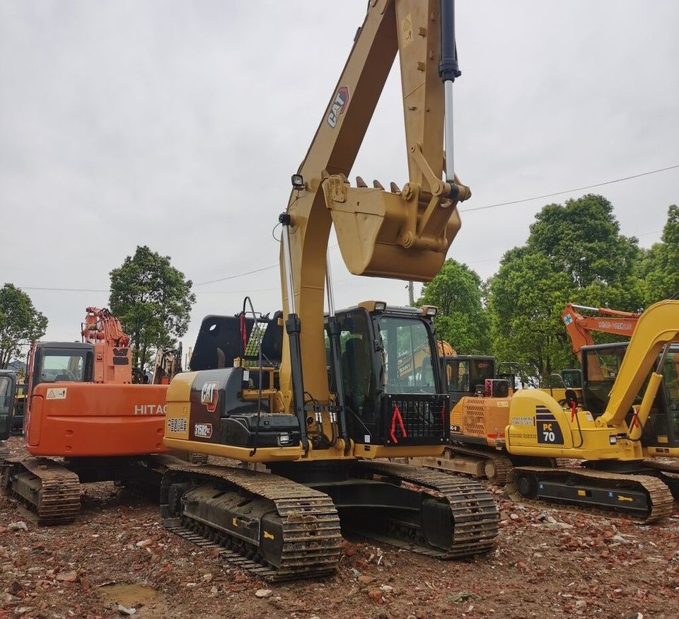 Caterpillar 315D2GC crawler excavator, side view Caterpillar 315D2GC crawler excavator, side view
