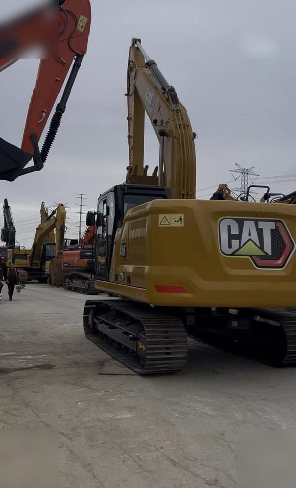 2023 Caterpillar 320GC crawler excavator rear view
