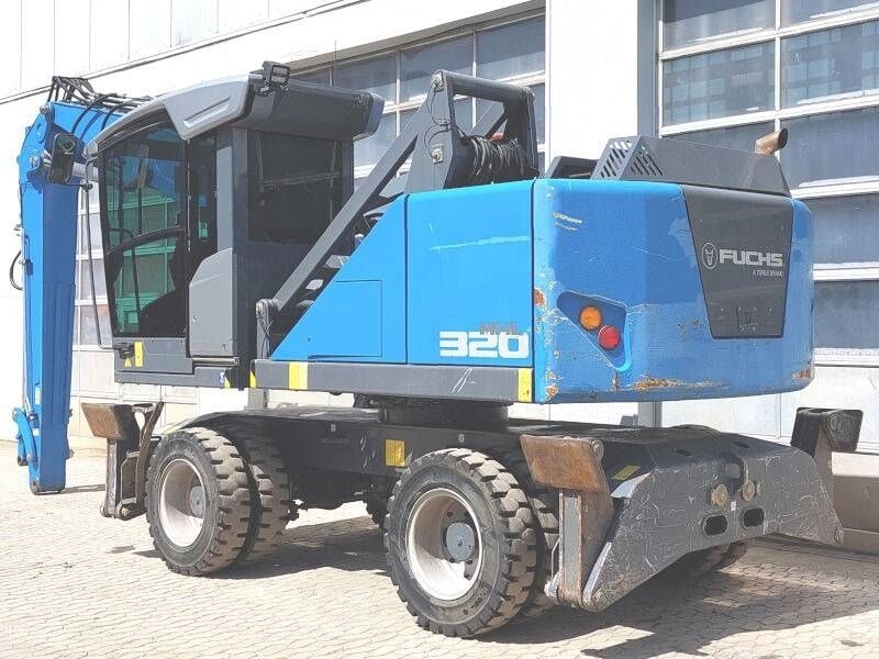 2019 Fuchs MHL320F material handler, rear three-quarter view 2019 Fuchs MHL320F material handler, rear three-quarter view