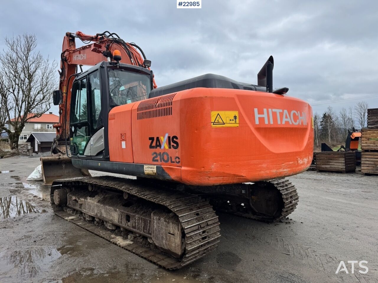 2013 Hitachi Zaxis 210LC crawler excavator, rear three-quarter view 2013 Hitachi Zaxis 210LC crawler excavator, rear three-quarter view
