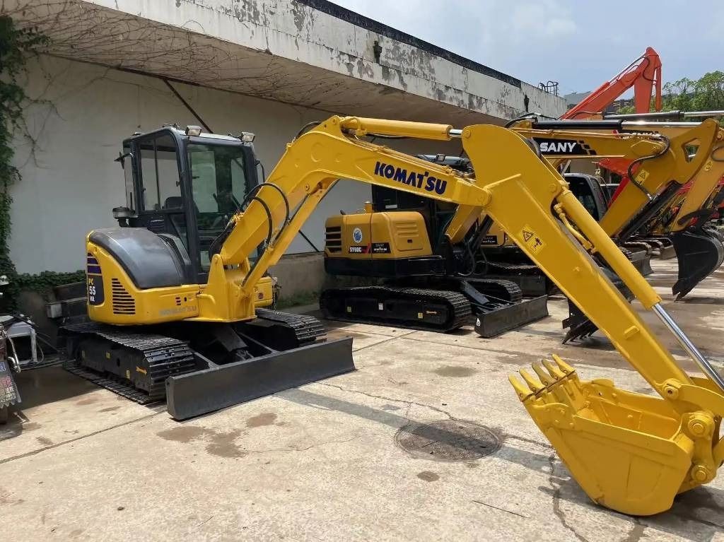 2022 Komatsu PC55MR-2 mini excavator, side view 2022 Komatsu PC55MR-2 mini excavator, side view