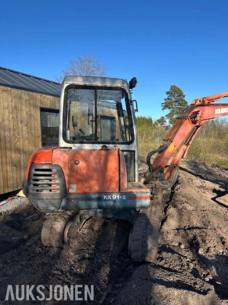 1999 Kubota KX91-2 mini excavator, rear three-quarter view