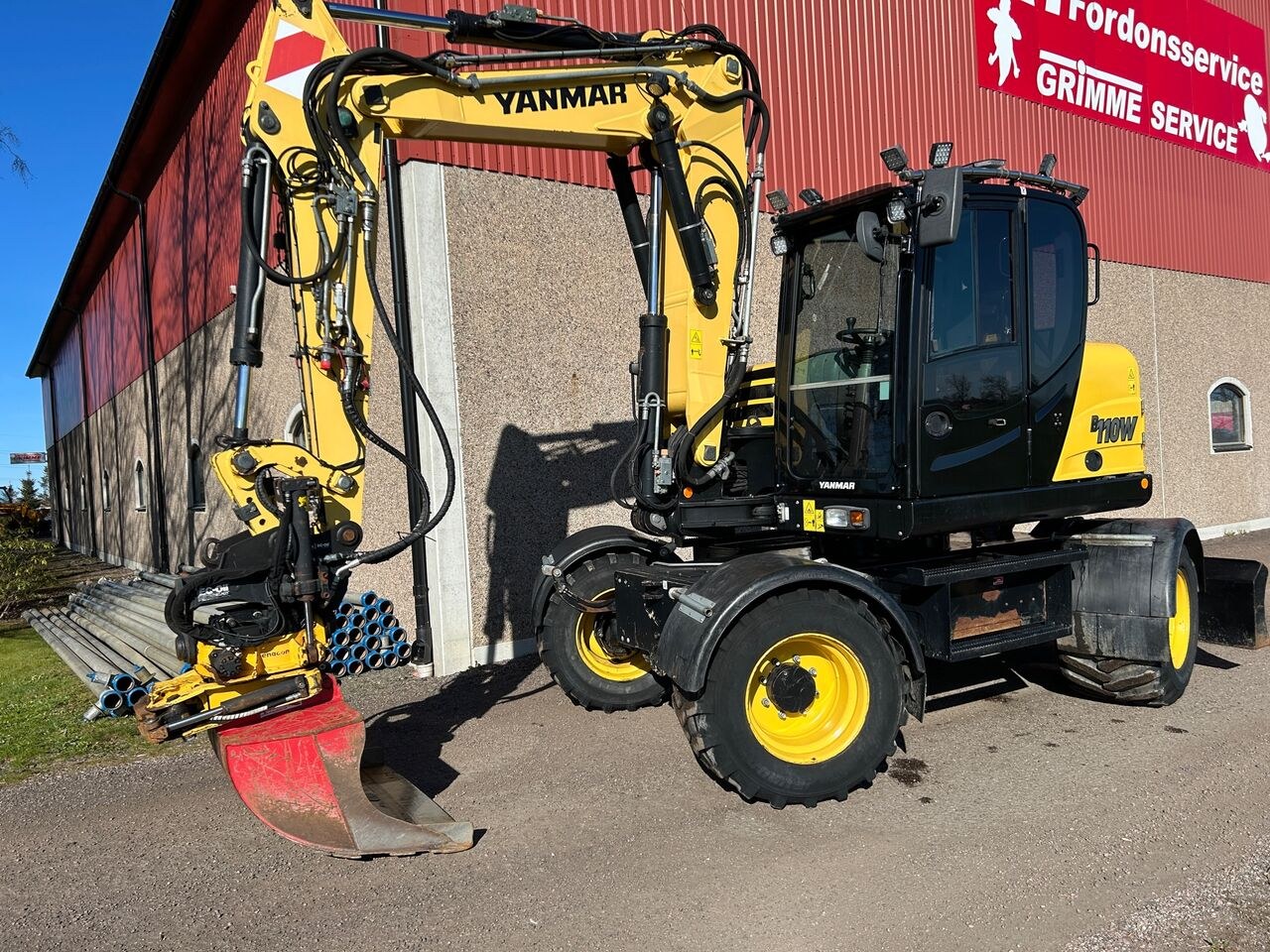 2018 Yanmar B110W excavator, side view