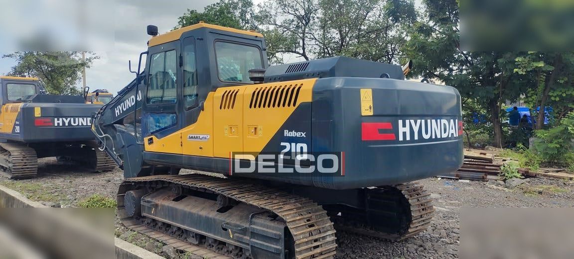 2026 Hyundai Robex 210 crawler excavator, rear three-quarter view