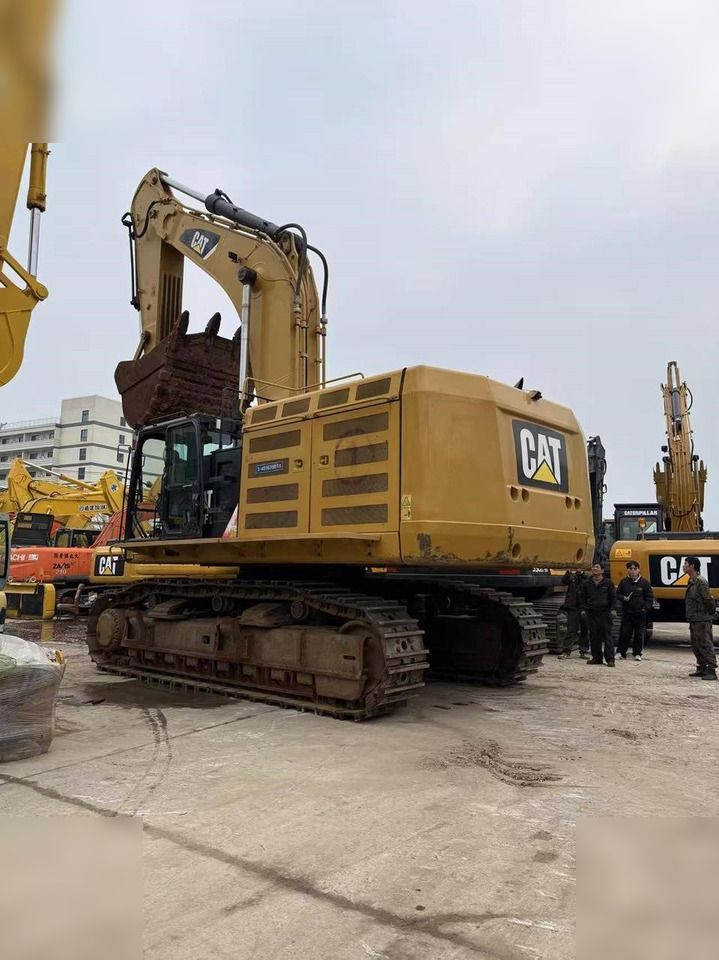 2025 Caterpillar 374FL crawler excavator, rear three-quarter view