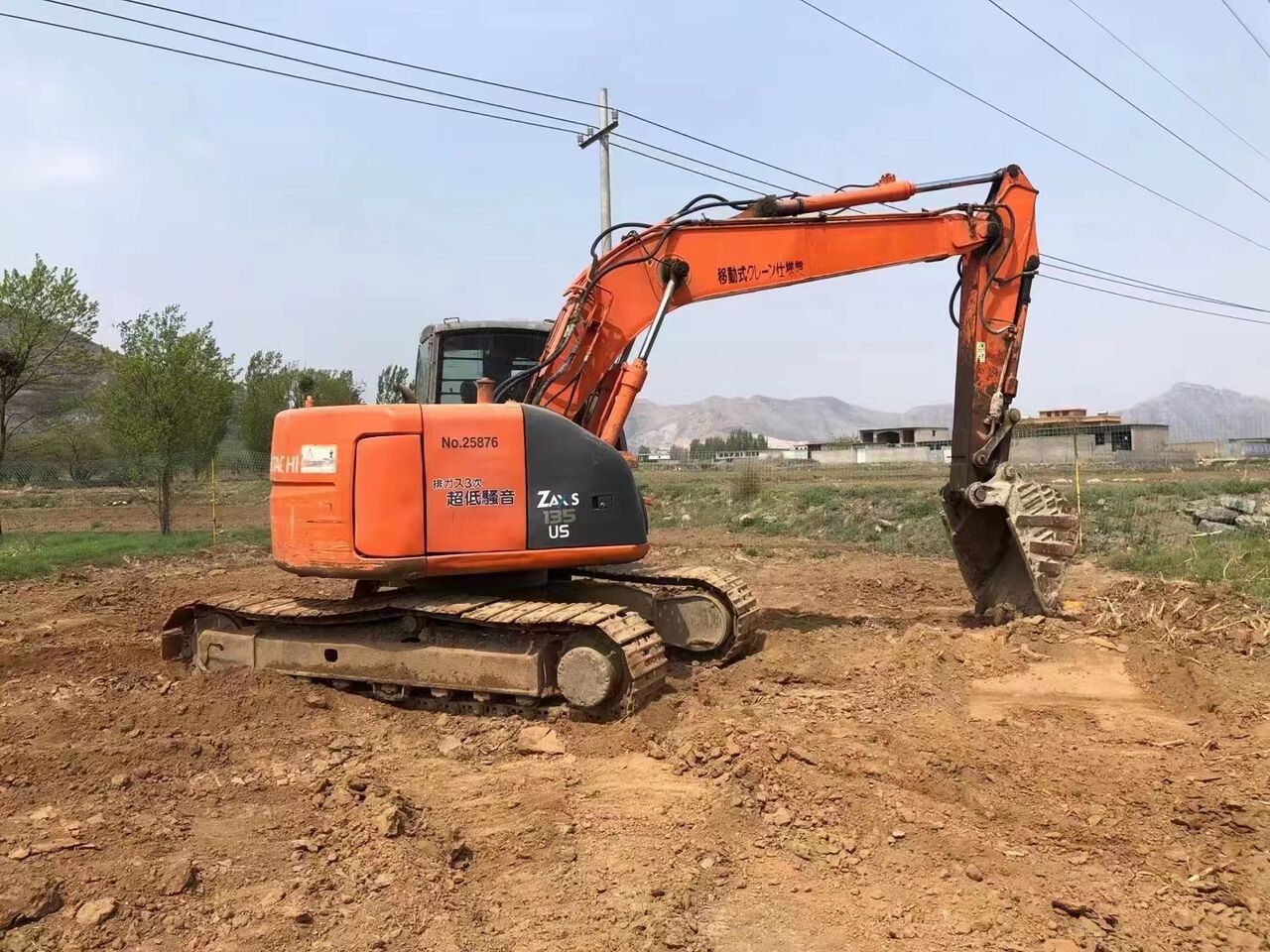 2023 Hitachi ZX135US-6 crawler excavator side view