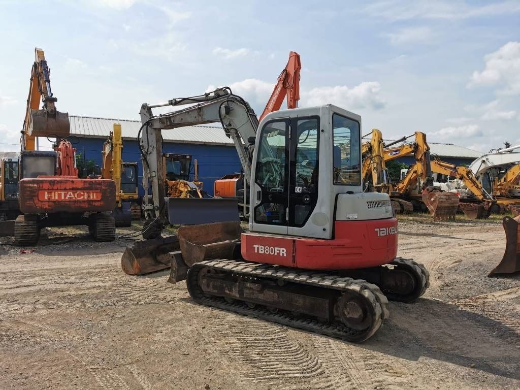 2003 Takeuchi TB80FR mini excavator, three-quarter front view 2003 Takeuchi TB80FR mini excavator, three-quarter front view