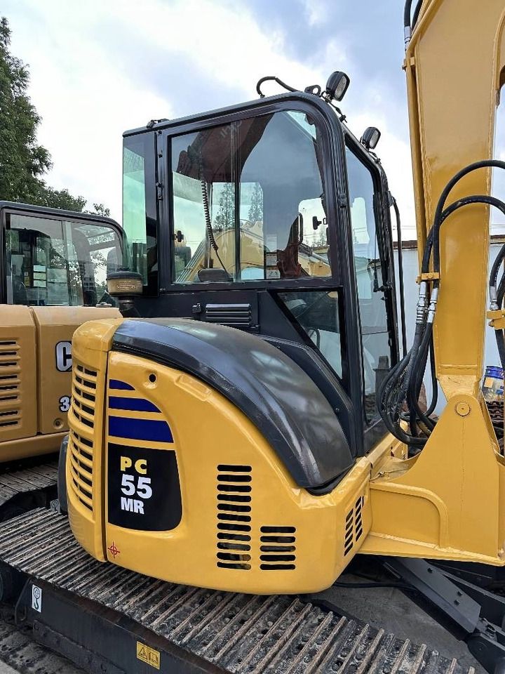 2023 Komatsu PC-55MR mini excavator, rear-quarter cab view 2023 Komatsu PC-55MR mini excavator, rear-quarter cab view