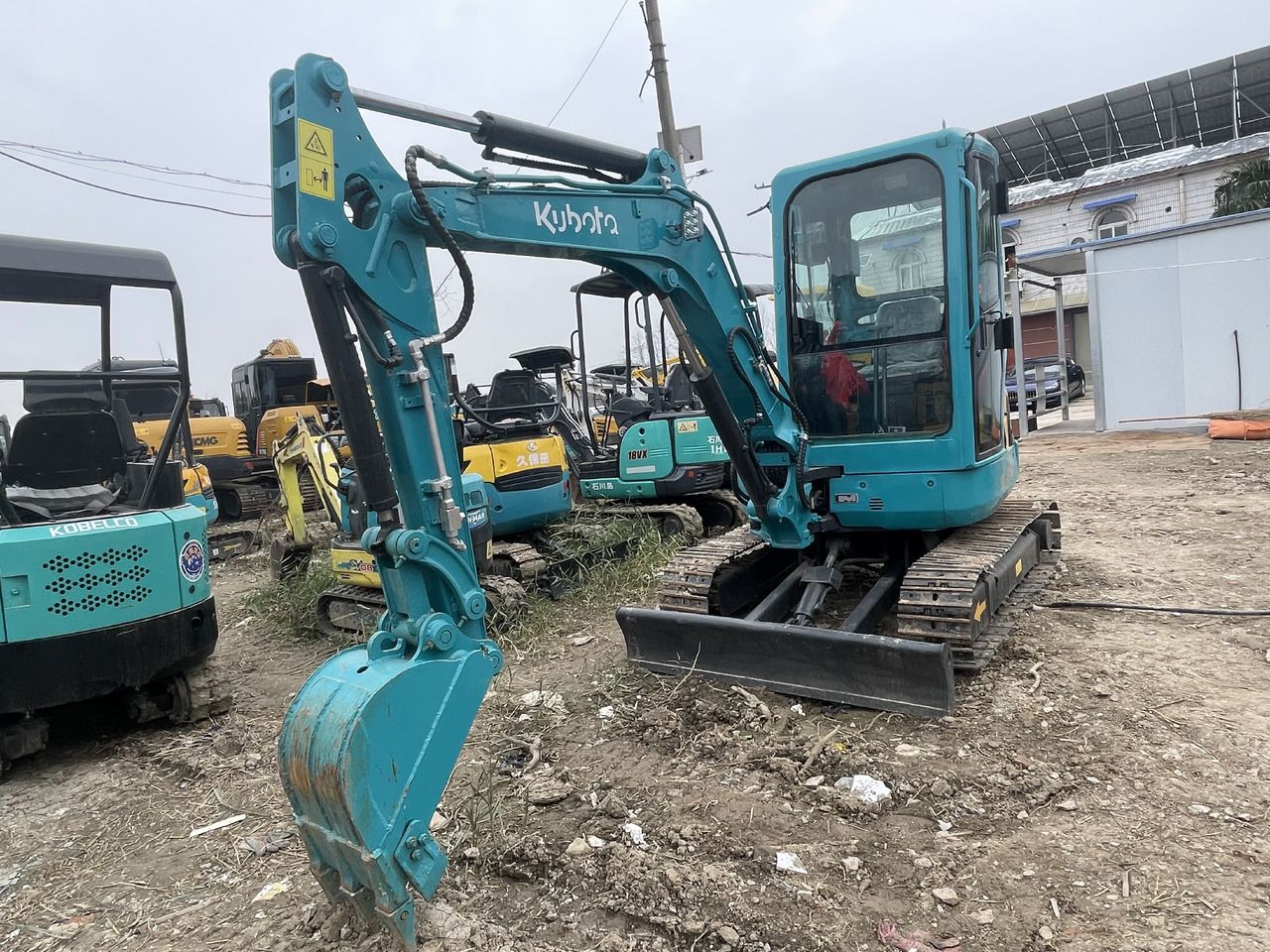 2022 Kubota U-30 mini excavator, front three-quarter view 2022 Kubota U-30 mini excavator, front three-quarter view