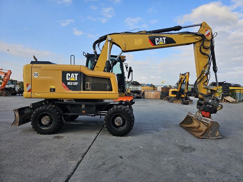 2016 Caterpillar M318F wheel excavator, side view 2016 Caterpillar M318F wheel excavator, side view