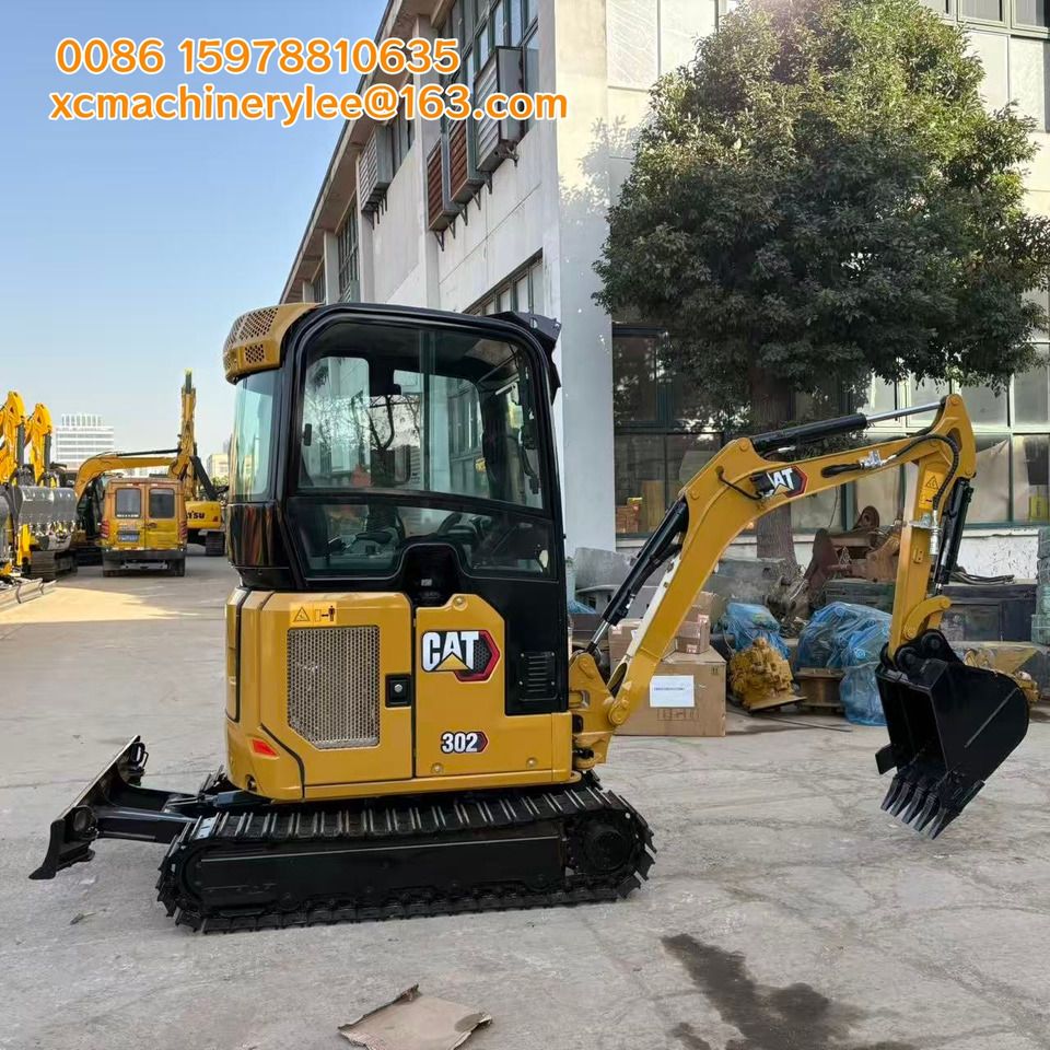 2025 Caterpillar 302 mini excavator, side view 2025 Caterpillar 302 mini excavator, side view