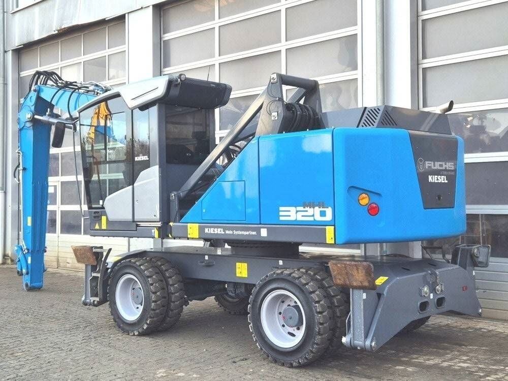 2023 Fuchs MHL320F material handler, side view