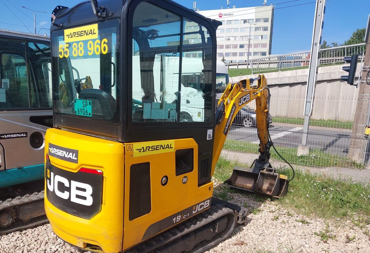 2022 JCB 19C-1 mini excavator, rear three-quarter view