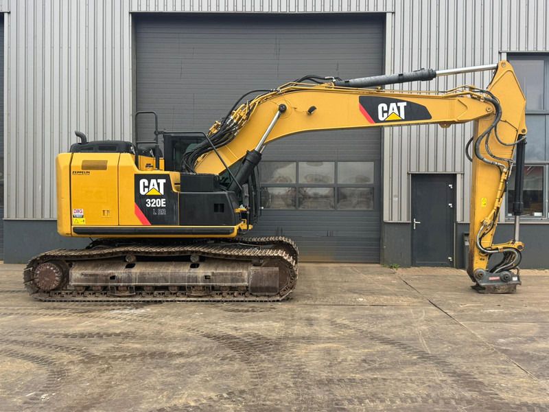 2013 Caterpillar 320E LRR crawler excavator, side view 2013 Caterpillar 320E LRR crawler excavator, side view