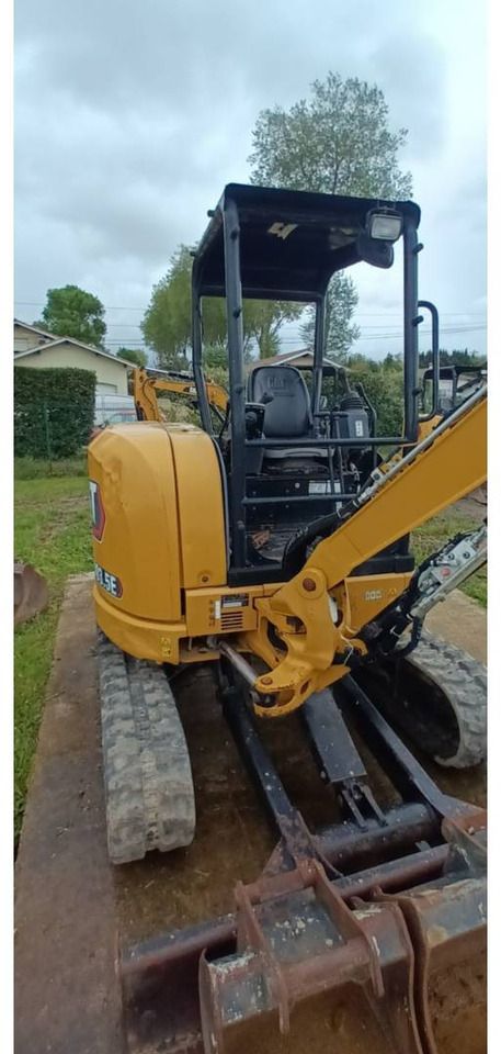 2020 Caterpillar 303.5E CR crawler excavator, rear three-quarter view