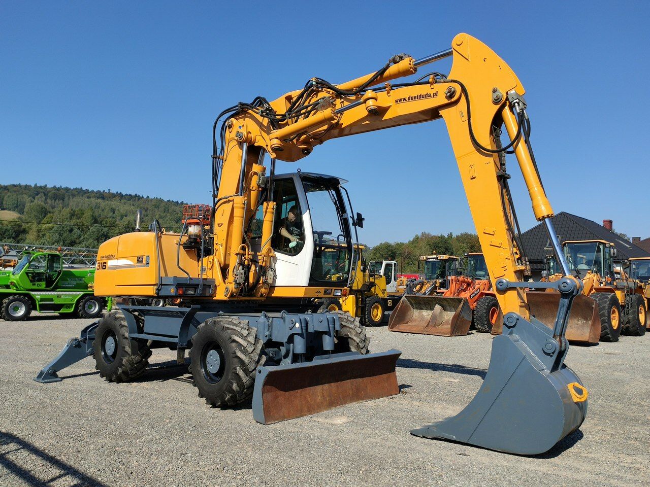 2008 Liebherr A316 wheel excavator, side view 2008 Liebherr A316 wheel excavator, side view