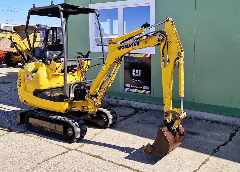 2002 Komatsu PC12R-8 mini excavator, side view 2002 Komatsu PC12R-8 mini excavator, side view