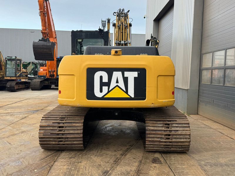 2011 Caterpillar 319DL crawler excavator, rear view