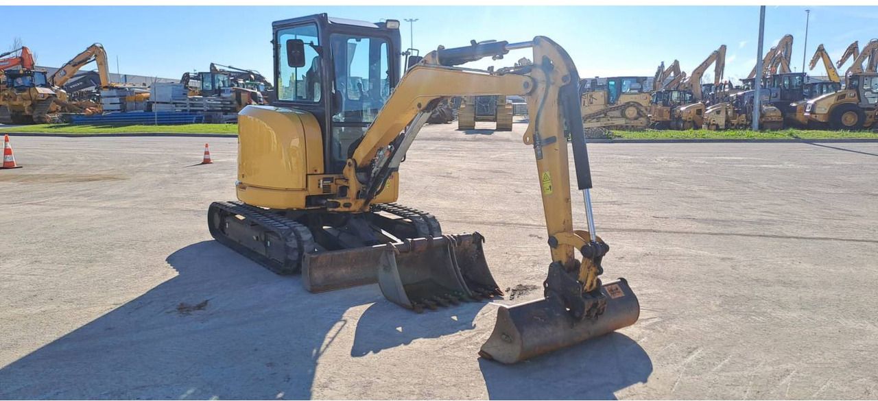 2021 Caterpillar 303.5E crawler excavator, front three-quarter view 2021 Caterpillar 303.5E crawler excavator, front three-quarter view