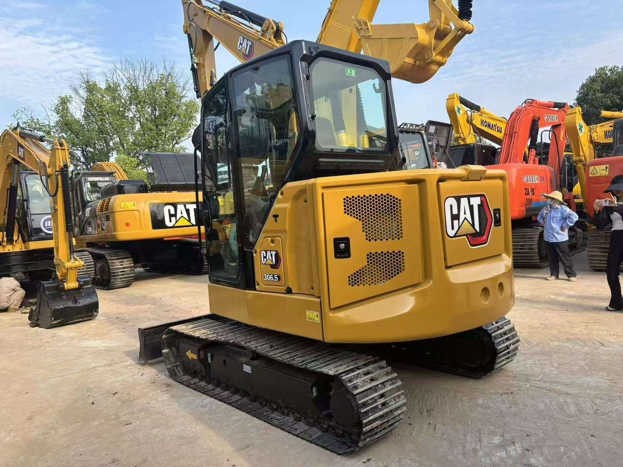 2024 Caterpillar 306.5 crawler excavator, rear three-quarter view