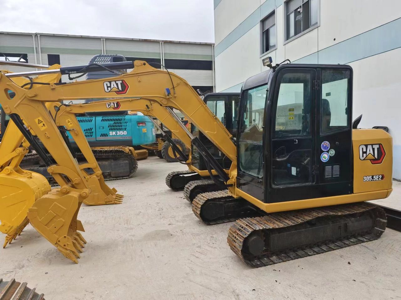2022 Caterpillar 305.5E2 mini excavator, side view 2022 Caterpillar 305.5E2 mini excavator, side view