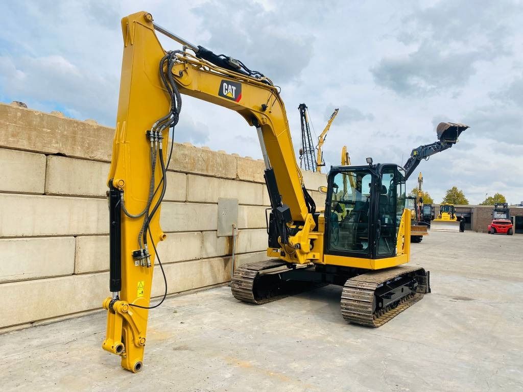 2019 Caterpillar 309 CR mini excavator, front three-quarter view