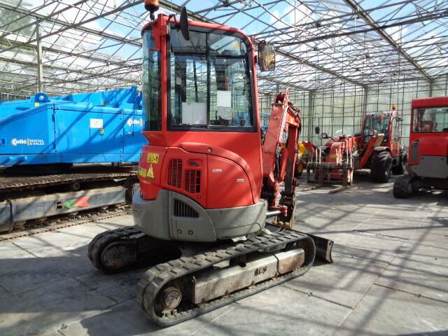 2016 Yanmar VIO25-4 mini excavator, rear three-quarter view 2016 Yanmar VIO25-4 mini excavator, rear three-quarter view
