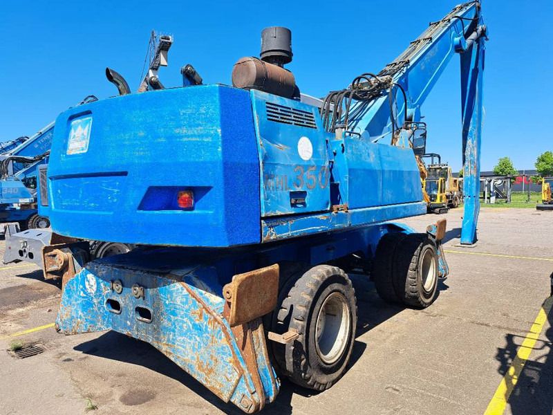 2006 Fuchs MHL350C material handler rear three-quarter view