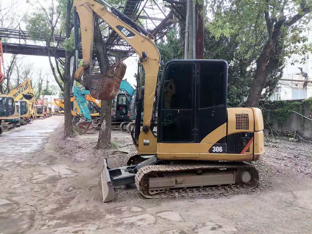 2022 Caterpillar 306E2 excavator side view 2022 Caterpillar 306E2 excavator side view