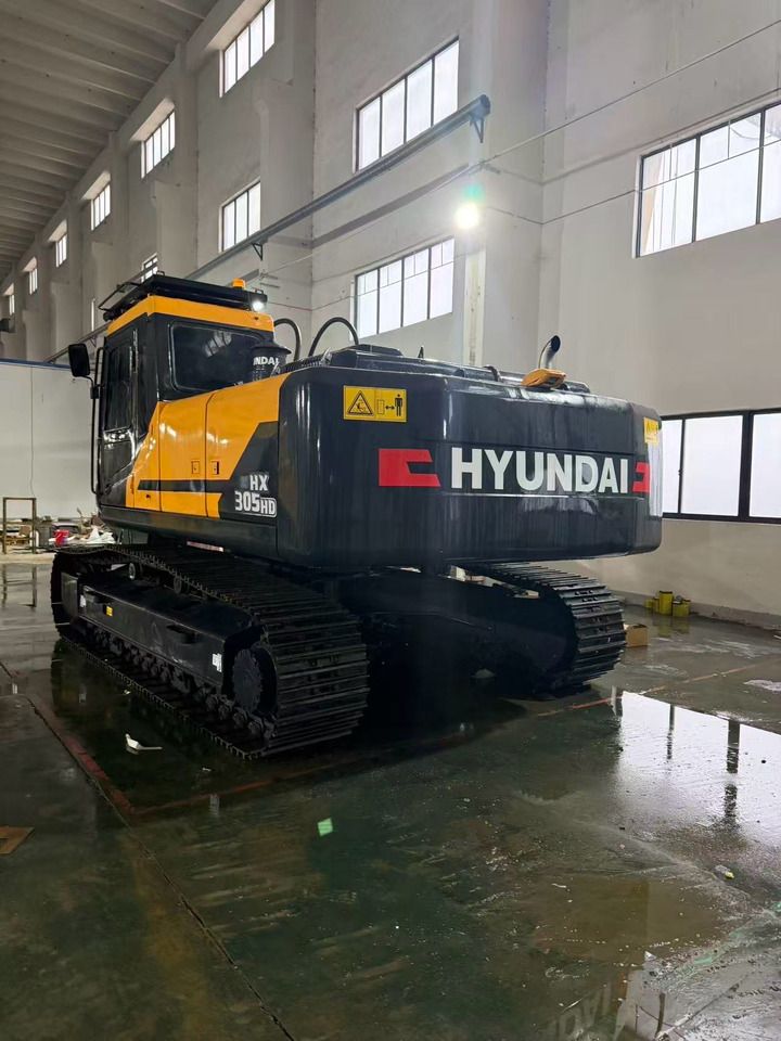 2020 Hyundai HX305-HD crawler excavator, rear three-quarter view