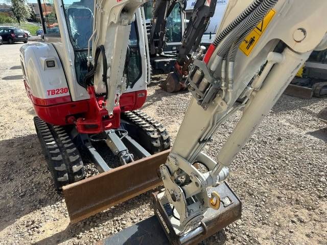 2025 Takeuchi TB230 V3 mini excavator, front three-quarter view 2025 Takeuchi TB230 V3 mini excavator, front three-quarter view