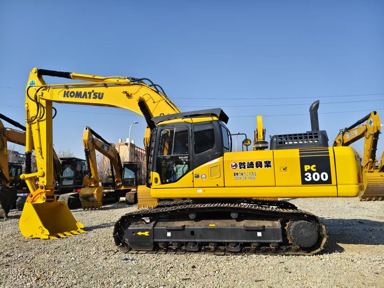 2022 Komatsu PC300-7 crawler excavator, side profile view