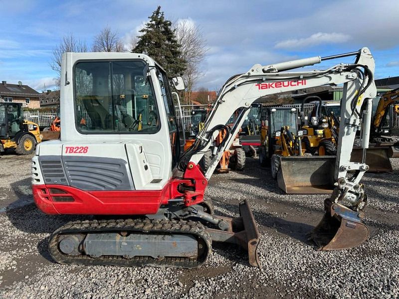 2011 Takeuchi TB 228 mini excavator, side view 2011 Takeuchi TB 228 mini excavator, side view