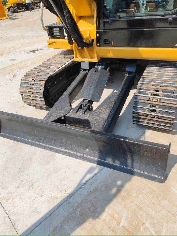 2022 Caterpillar 305.5 mini excavator front blade view 2022 Caterpillar 305.5 mini excavator front blade view