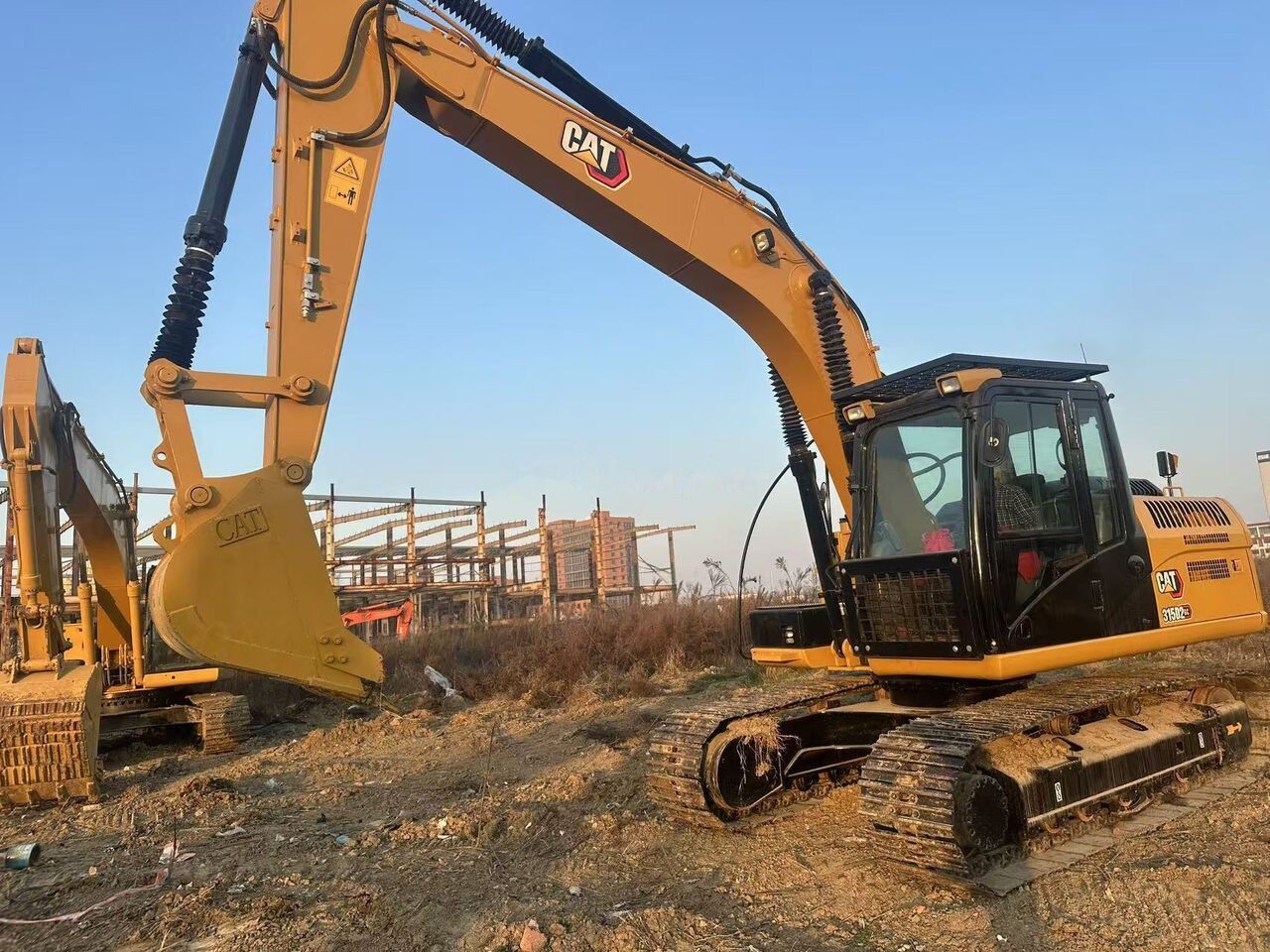 Caterpillar 315D2 crawler excavator, side view