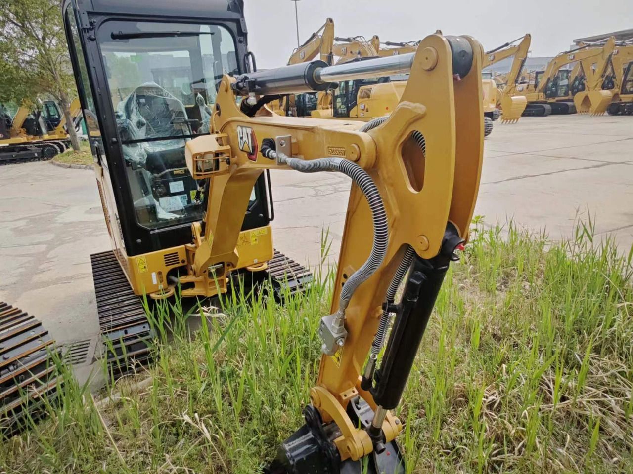 2026 Caterpillar 302CR mini excavator boom and cab view 2026 Caterpillar 302CR mini excavator boom and cab view