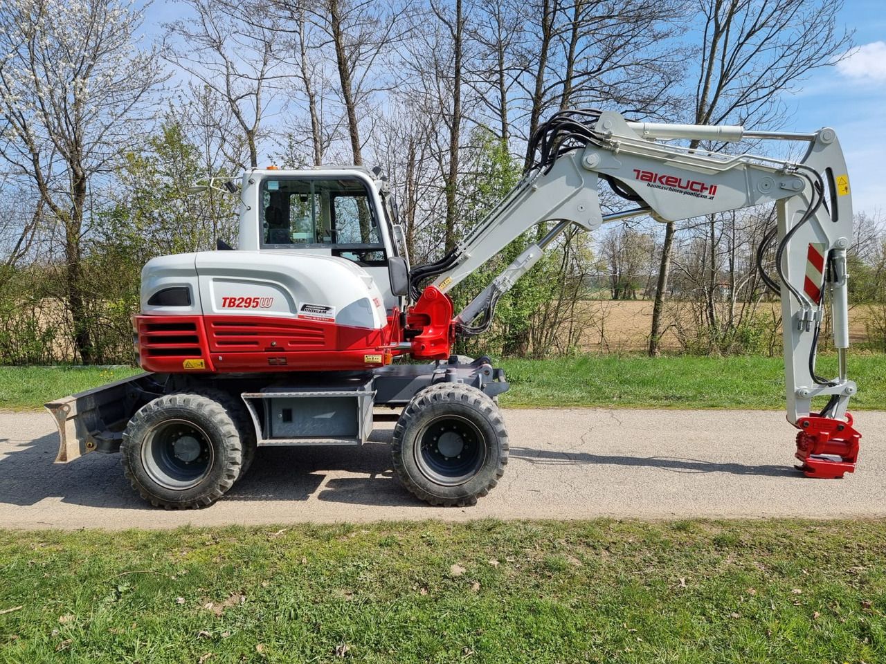 2015 Takeuchi TB295W wheel excavator, side view 2015 Takeuchi TB295W wheel excavator, side view