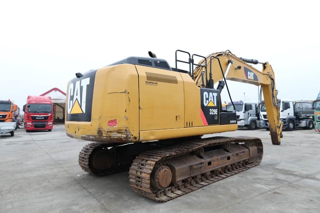 2014 Caterpillar 329ELN crawler excavator, rear three-quarter view 2014 Caterpillar 329ELN crawler excavator, rear three-quarter view