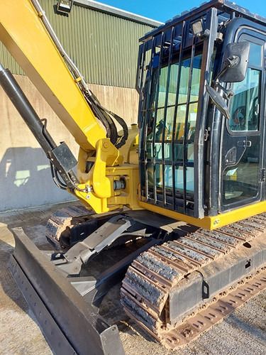 2019 Caterpillar 308E2CR crawler excavator, side view of cab and blade 2019 Caterpillar 308E2CR crawler excavator, side view of cab and blade